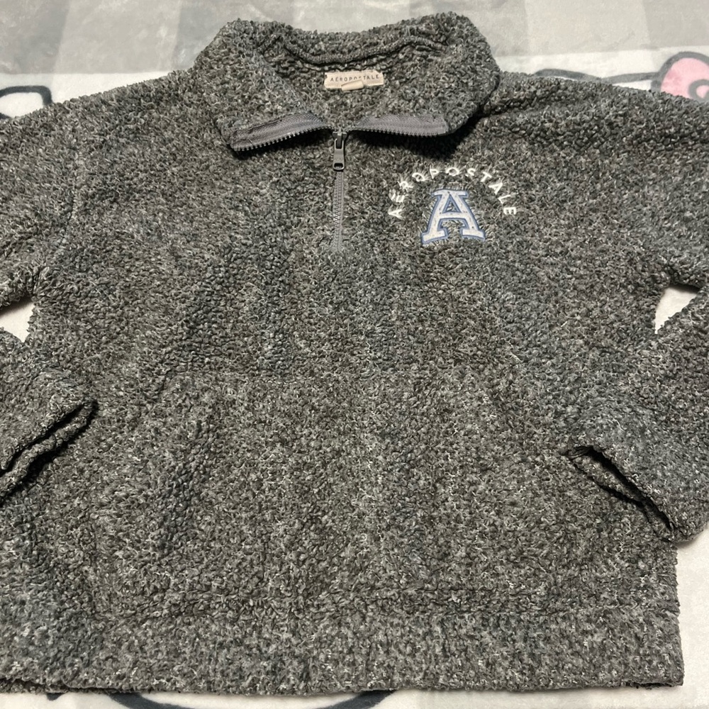 2 Aeropostale sweaters 1 brand new no tags and the other one is used both XS